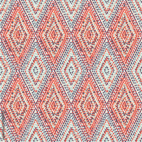 Seamless geometric pattern. Grunge texture with imitation tweed. Bohemian print for home decor, textiles, pillows, rugs. Vector illustration.
