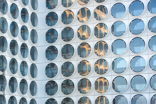 Detail of a residentional building with many round windows
