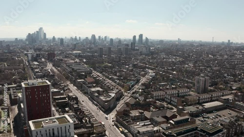 Slider aerial shot over Dalston looking towards central London skyscrapers photo