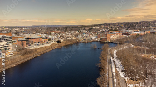 Aerial view of part of the city of Magog in Quebec, Canada, with its river.