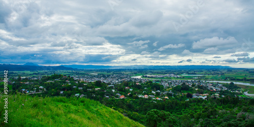 Panoramic aerial view over town of Whakatane. The heart of the Eastern Bay of Plenty, New Zealand, it's nested between Whakatane River and bush-clad cliffs. Kohi Point Lookout, Whakatane, New Zealand