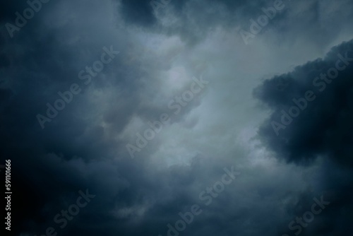 Beautiful shot of large clouds in a dark stormy sky