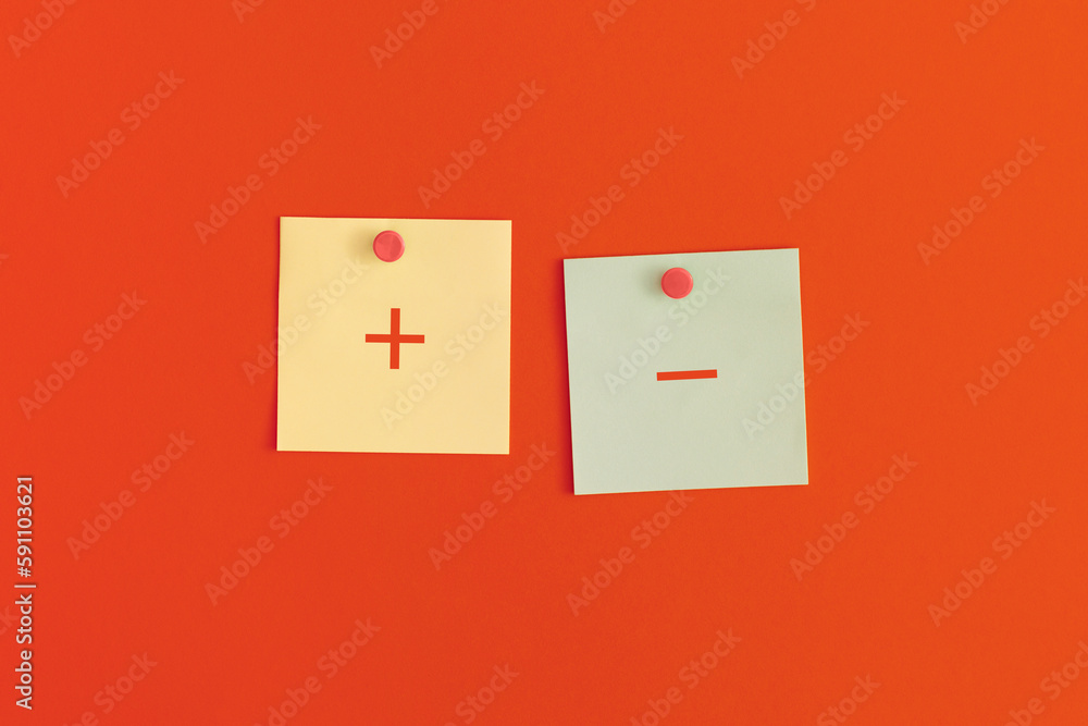 Sticky notes with concept of positive and negative evaluation in decision making, approval or voting.