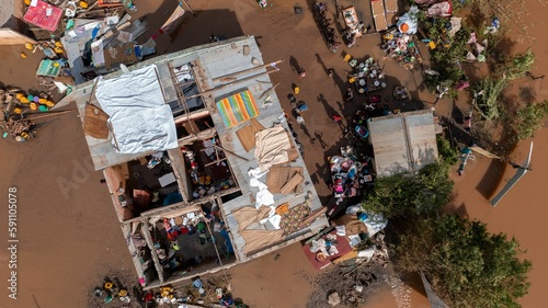 Aerial of the poor population of Africa living in old buildings during the flood