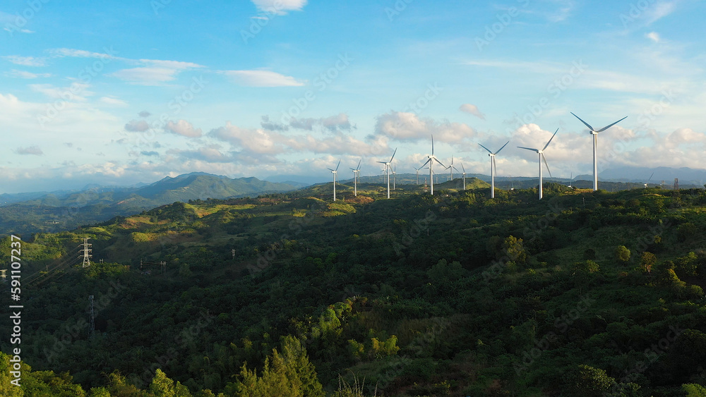 Wind turbines in the mountains. Wind mills for electric power production in the Philippines, Luzon.