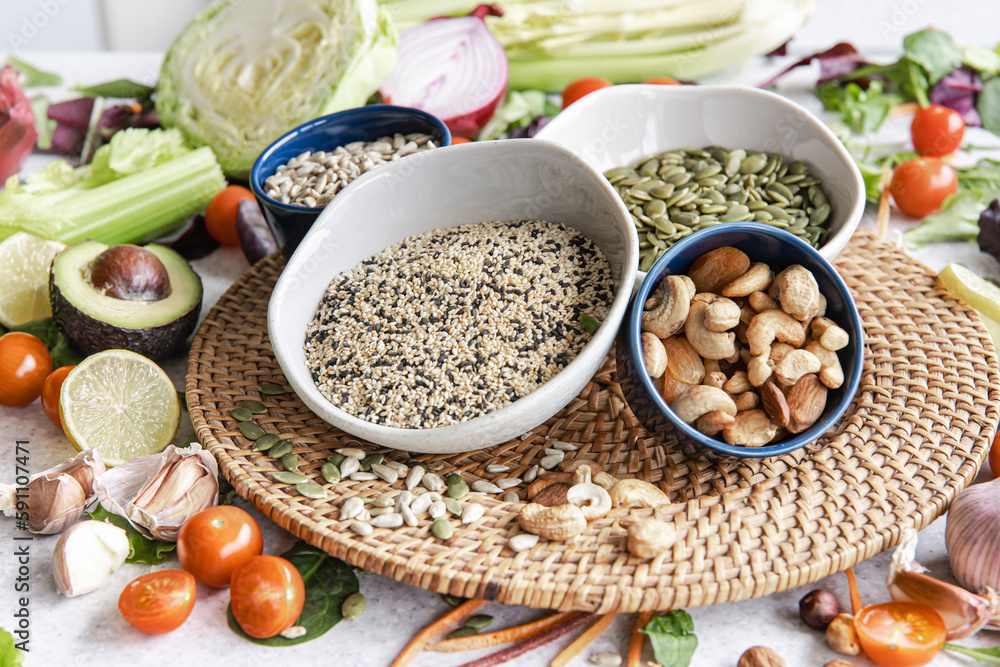 Close-up, a bowl of chia seeds and other healthy foods on the kitchen table. Close-up, a bowl of chia seeds and other healthy foods on the kitchen table.