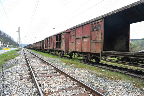 Train on Railway tracks. A freight car at a railway station. Transportation. Goods Wagon.