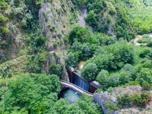 Paleokaria waterfall and ancient bridge, Thessaly, Greece, Europe photo