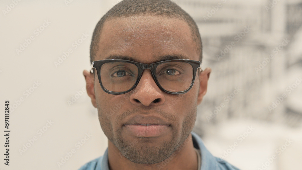 Close Up of Serious African Man Looking at Camera Close Up of Serious African Man Looking at Camera