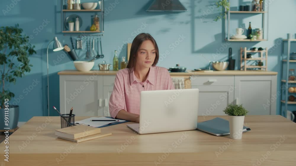 Excited Young Woman Winner Looks at Laptop Celebrates Online Success at Home. Woman Gets New Distance Job Opportunity, Reads Good News in Email, Rejoices Victory.Distance Learning and Victory Concept. Excited Young Woman Winner Looks at Laptop Celebrates Online Success at Home. Woman Gets New Distance Job Opportunity, Reads Good News in Email, Rejoices Victory.Distance Learning and Victory Concept.