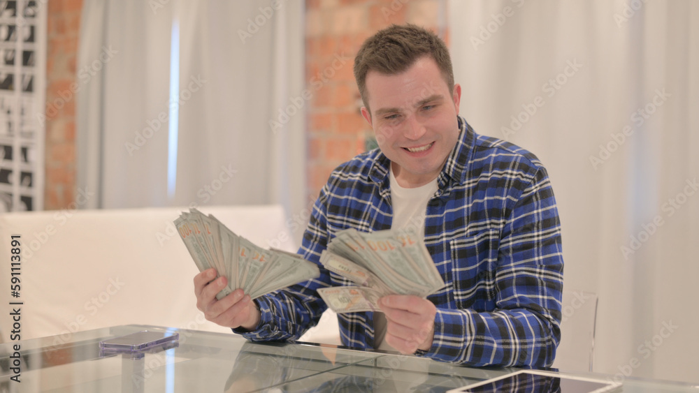 Excited Young Casual Man Throwing Money in Air, Success Excited Young Casual Man Throwing Money in Air, Success
