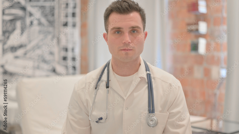 Portrait of Serious Male Doctor in Clinic Portrait of Serious Male Doctor in Clinic
