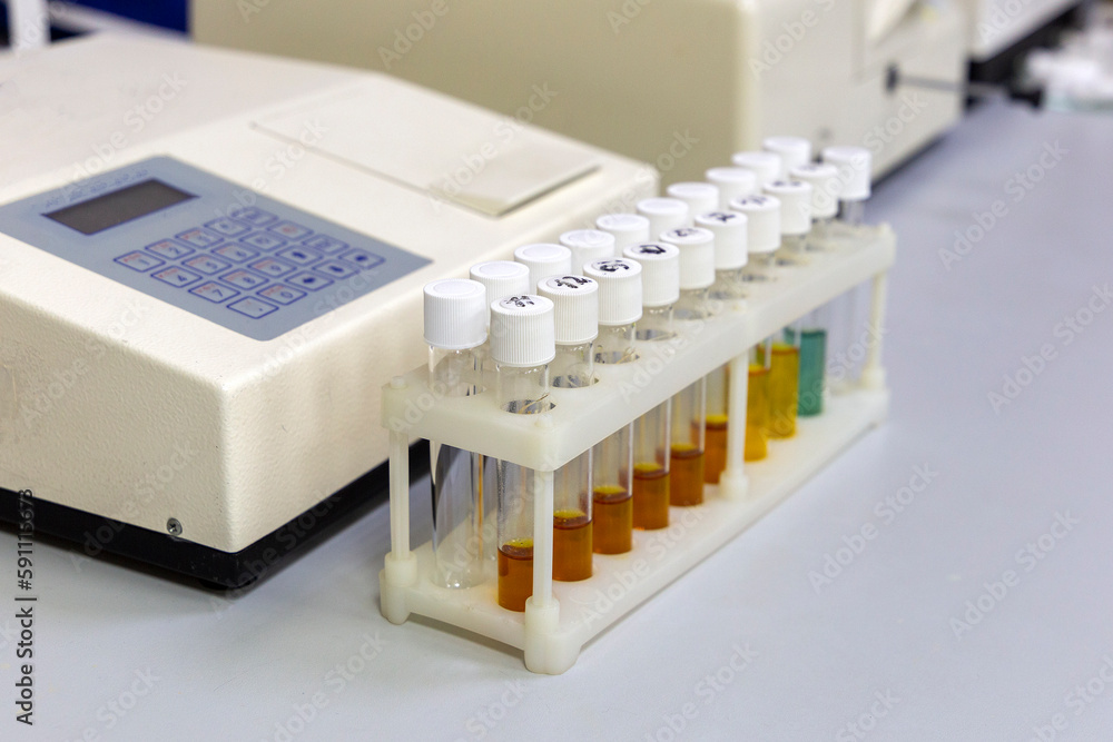 Test tubes with multicolored reagent analysis. Colorimetry experiment