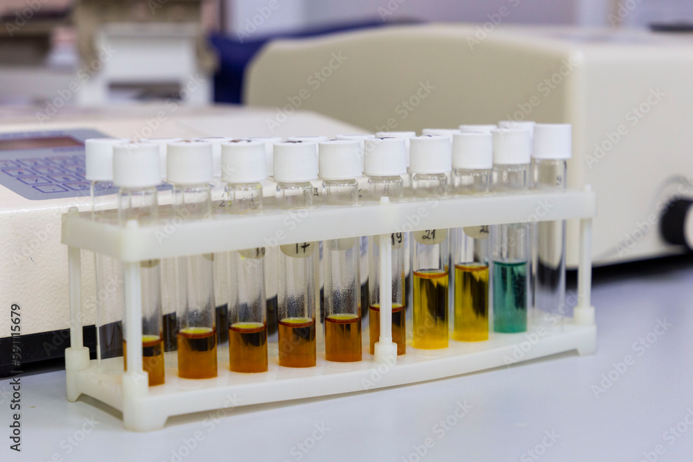 Test tubes with multicolored reagent analysis. Colorimetry experiment