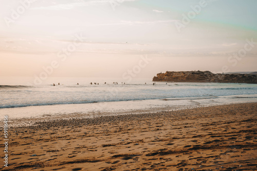 Sunset over Devil's Rock at Surfer Point in Tamraght, Morocco photo