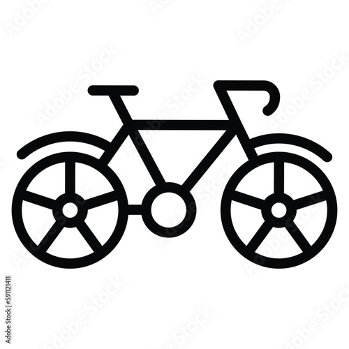 A young boy stopped his�bicycle�in front of the store