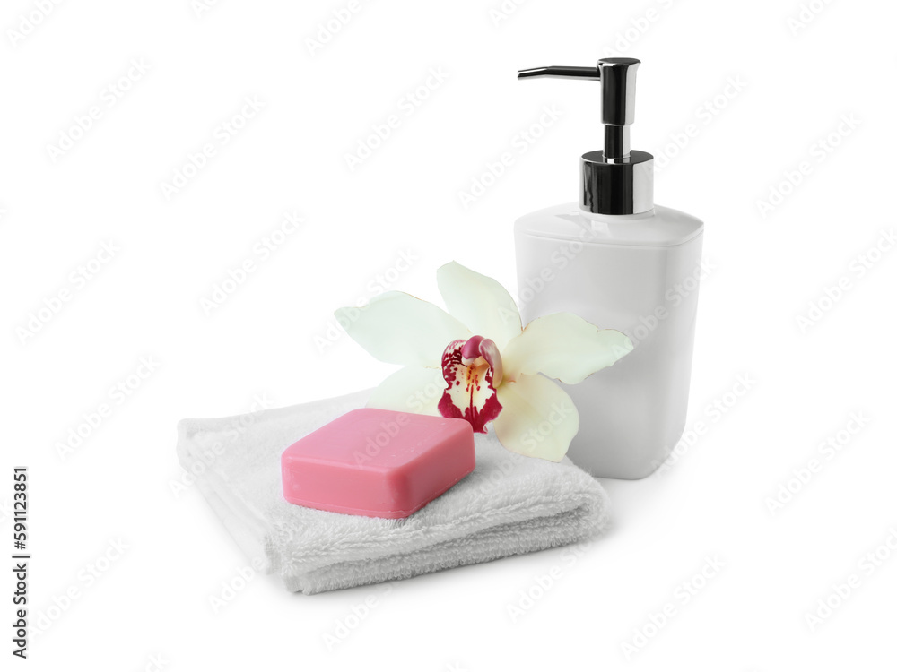 Soap bar, dispenser and terry towel on white background Soap bar, dispenser and terry towel on white background
