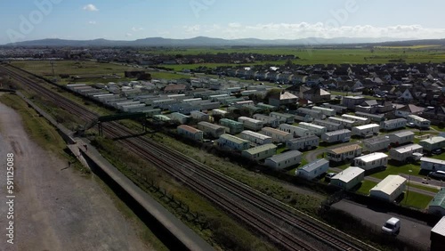 Aerial view approaching Abergele static caravan park holiday homes in Pensarn beachfront town on the Wales coastal path photo