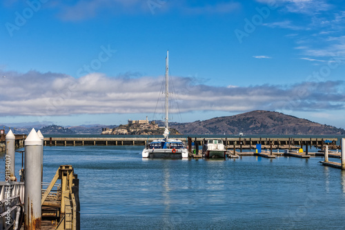 Boats docked in Fisherman's wharf with Alcatraz Island in the backgriund, San Francisco, California © Gilberto Mesquita