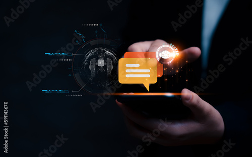 Businessman using chatbot system to digital marketing strategy idea ,target of investment growth, chatbot application software futuristic technology ,business of AI artificial intelligence innovation.