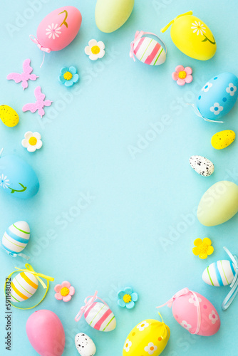 Easter background on blue. Holiday decorations with copy space. © nadianb