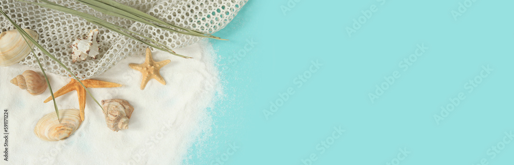 Summer banner with white mesh, palm leaf, shells and starfish on the sand. Top view summer composition with copy space. Seaside vacation concept, blue background Summer banner with white mesh, palm leaf, shells and starfish on the sand. Top view summer composition with copy space. Seaside vacation concept, blue background