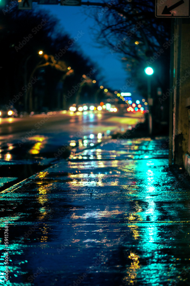 Wet Streets of the City in Spring at Night