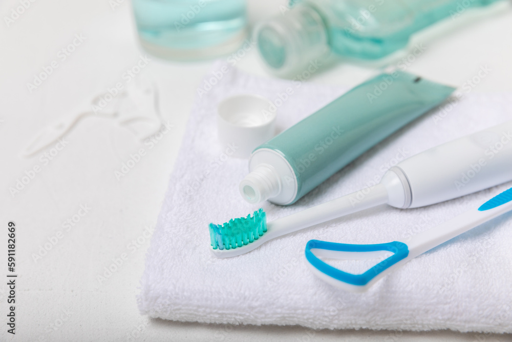 Modern sonic or electric toothbrush with charger in the bathroom. The concept of professional oral care and healthy teeth. Place for text. Close-up. Minimal design. Fresh breath. Healthy teeth. Modern sonic or electric toothbrush with charger in the bathroom. The concept of professional oral care and healthy teeth. Place for text. Close-up. Minimal design. Fresh breath. Healthy teeth.