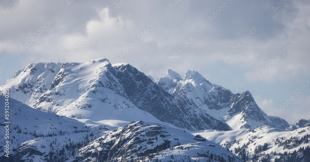 Tantalus Range Mountain covered in Snow. Canadian Landscape Nature Background. Squamish, BC, Canada.