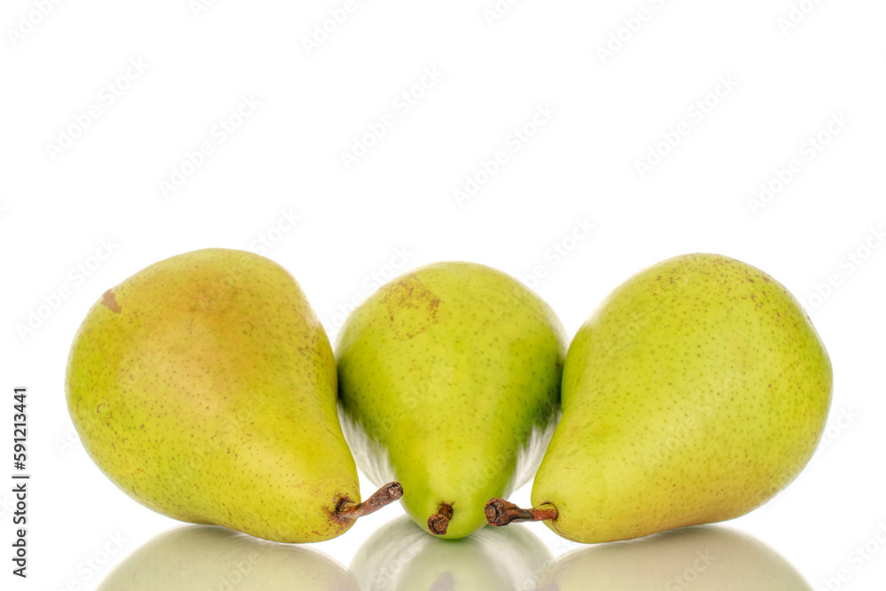 Three ripe organic pears, macro, on a w background.