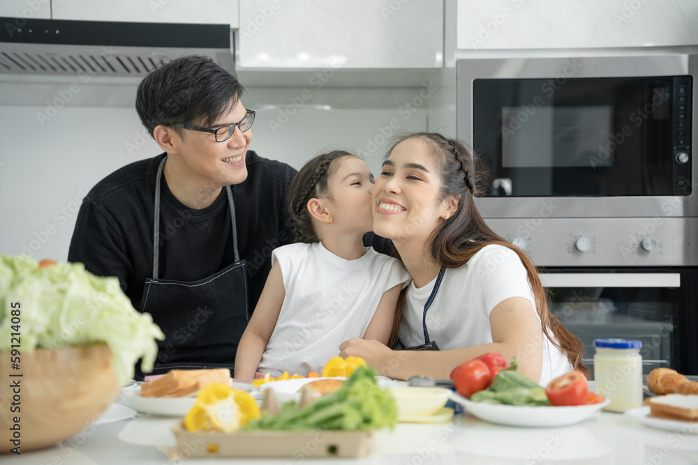 New home for family. activities together during the holidays. Parents and children are having activity on vacant time. weekend, enjoyment, happy family, togetherness, feel good. Kitchen