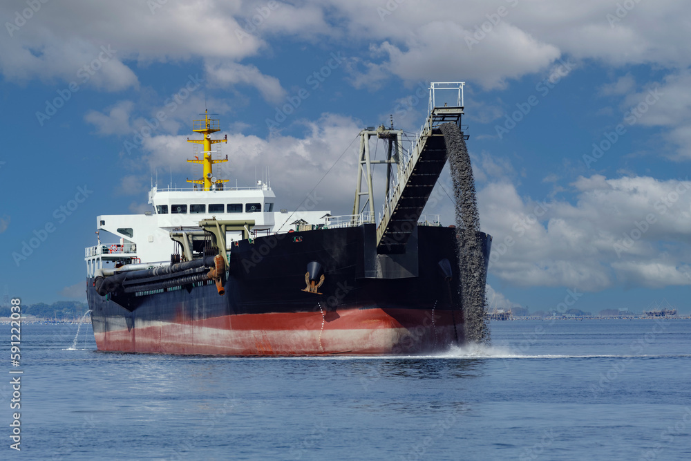 Fototapeta premium Dredging and commical excavation of Manila Bay