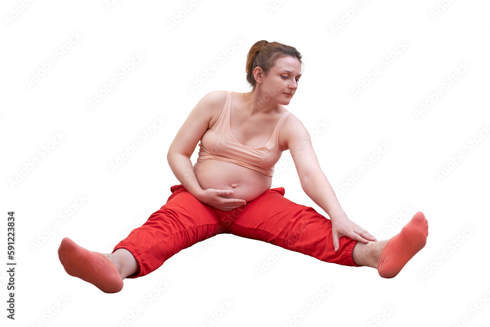 Fitness during pregnancy in the home, isolated on a white backgroundt. A pregnant woman stretches her leg and arm muscles at a sports training session at home