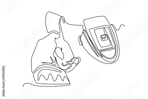 Continuous one-line drawing Doctor's hand checks the boy's blood pressure with a sphygmomanometer. World hypertension day concept single line draws design graphic vector illustration