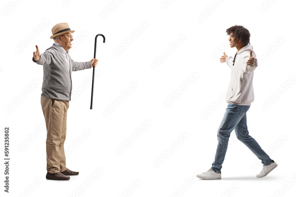 Full length profile shot of an elderly gentleman meeting a younger african american man Full length profile shot of an elderly gentleman meeting a younger african american man