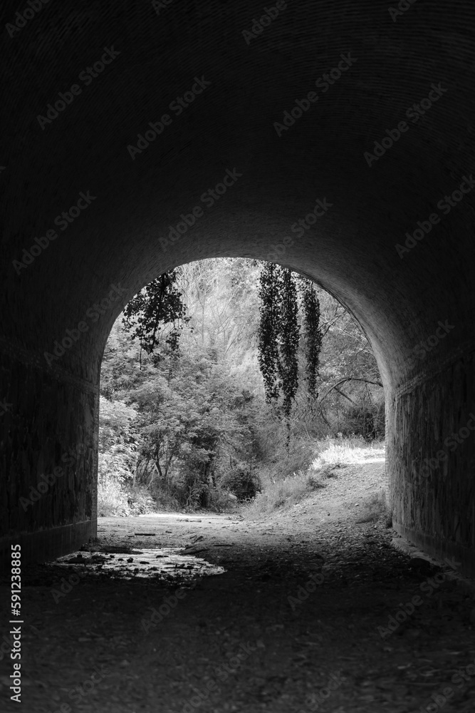 Tunnel under the railway tracks, part of a rural road in Spain.