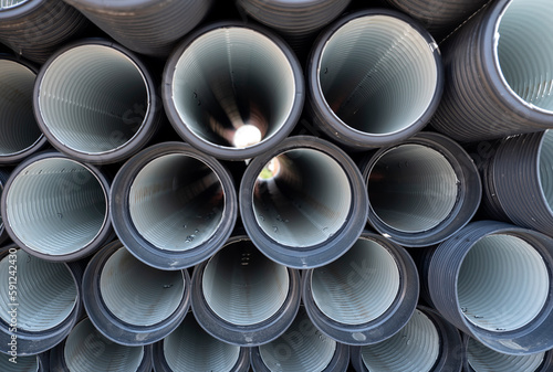 construction pipes stacked on the street
