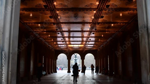 Street performer in Central Park NYC in  silhouette 