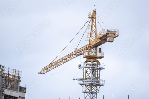 giant crane in a construction in a late afternoon
