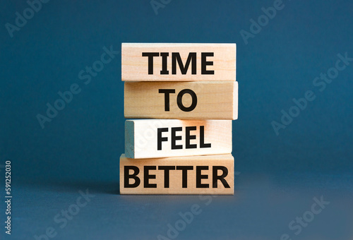 Time to feel better symbol. Concept words Time to feel better on wooden block. Beautiful grey table grey background. Motivational business time to feel better concept. Copy space