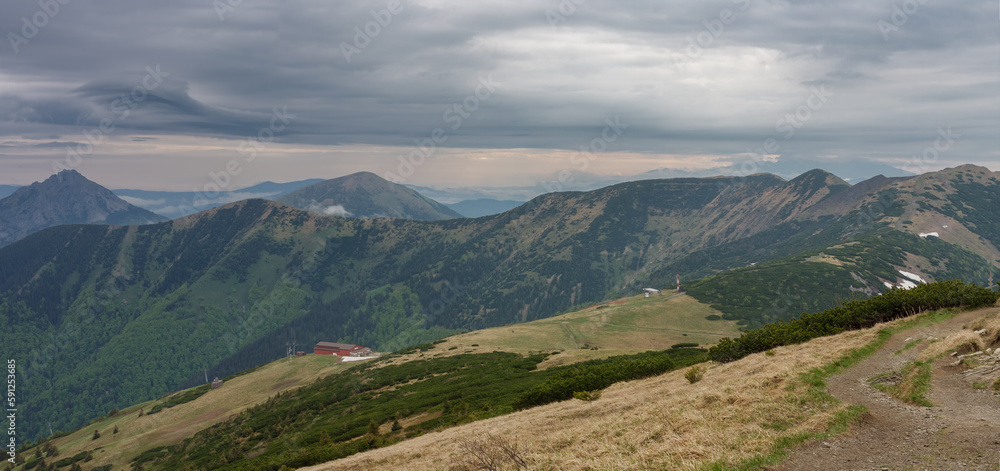 Obraz premium Upper station of chairlift in Snilovske sedlo, Chleb, Steny, Stoh, Velky Rozsutec, view from path to Velky Krivan in national park Mala Fatra.