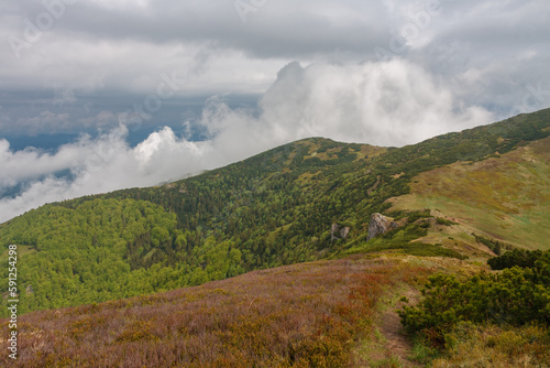 Mountain pass Bublen, view from path to Maly Krivan, national park Mala Fatra, Slovakia, in spring cloudy day