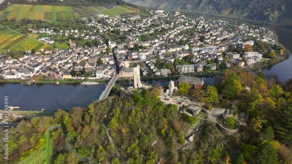 Ancient Ruins, Aerial Drone Shot in autumn of Traben-Trarbach City with Morning Fog. River Moselle, Germany. Moselland. Ancient Ruins, Aerial Drone Shot in autumn of Traben-Trarbach City with Morning Fog. River Moselle, Germany. Moselland.