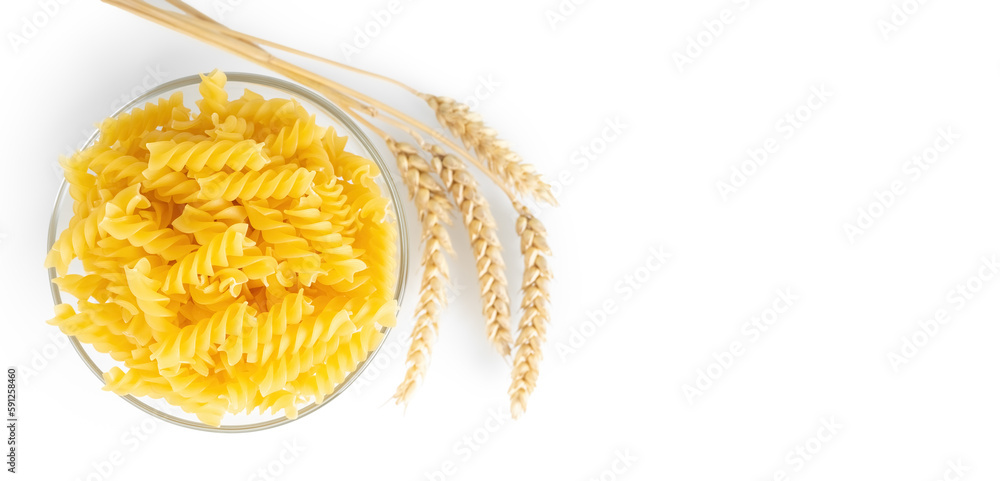 Pasta and wheat spikelets isolated on white background, banner, header, template with copy space. Raw pasta fusilli, ingredient for cook, traditonal italian cuisine. Flat lay, top view