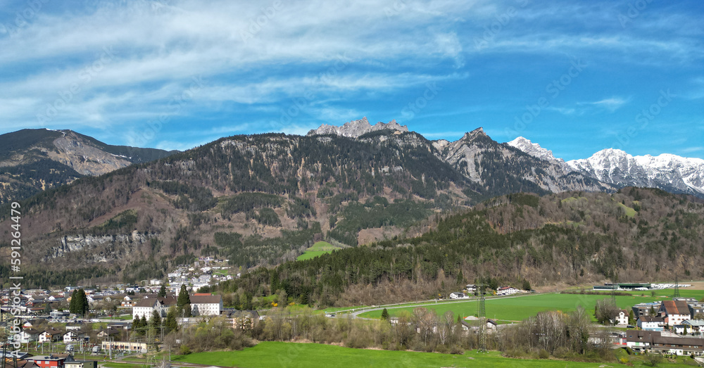 view of the city of Bludenz from the air, alpine landscape, spring