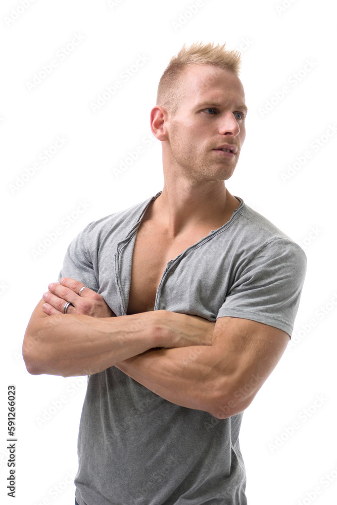 Young Gym Fit Man Showing His Sexy Muscular Chest While Looking at the Camera Young Gym Fit Man Showing His Sexy Muscular Chest While Looking at the Camera