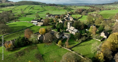 Aerial shot of a chuch and small English village photo