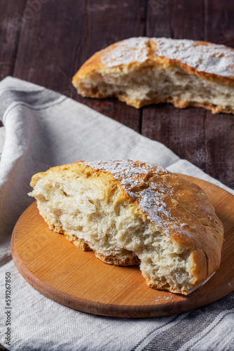 Obraz na płótnie Homemade ciabatta bread with whole grain flour on a wooden background. Rustic style. w salonie