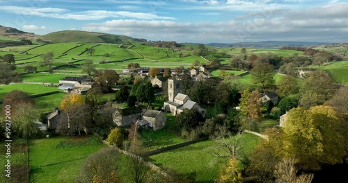Aerial shot of a church in the English countryside