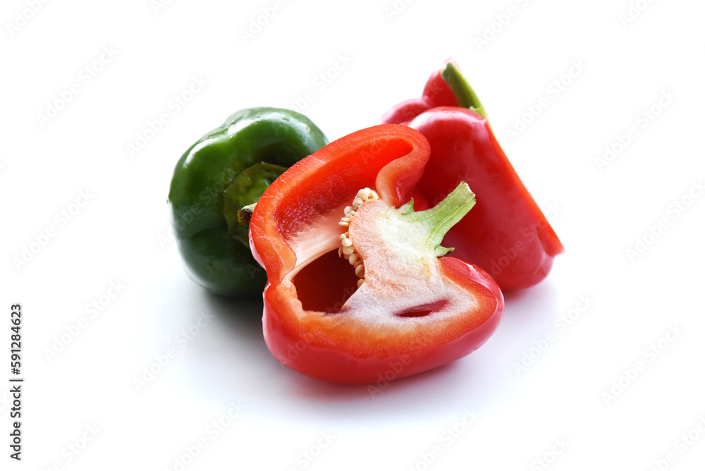 Sweet bell peppers, just washed wet and shiny. Whole and halved fruit, red and green colors contrast on white background. Ripe fresh Bulgarian peppers. Tasty healthy food from Greek garden.
Sweet bell peppers, just washed wet and shiny. Whole and halved fruit, red and green colors contrast on white background. Ripe fresh Bulgarian peppers. Tasty healthy food from Greek garden.